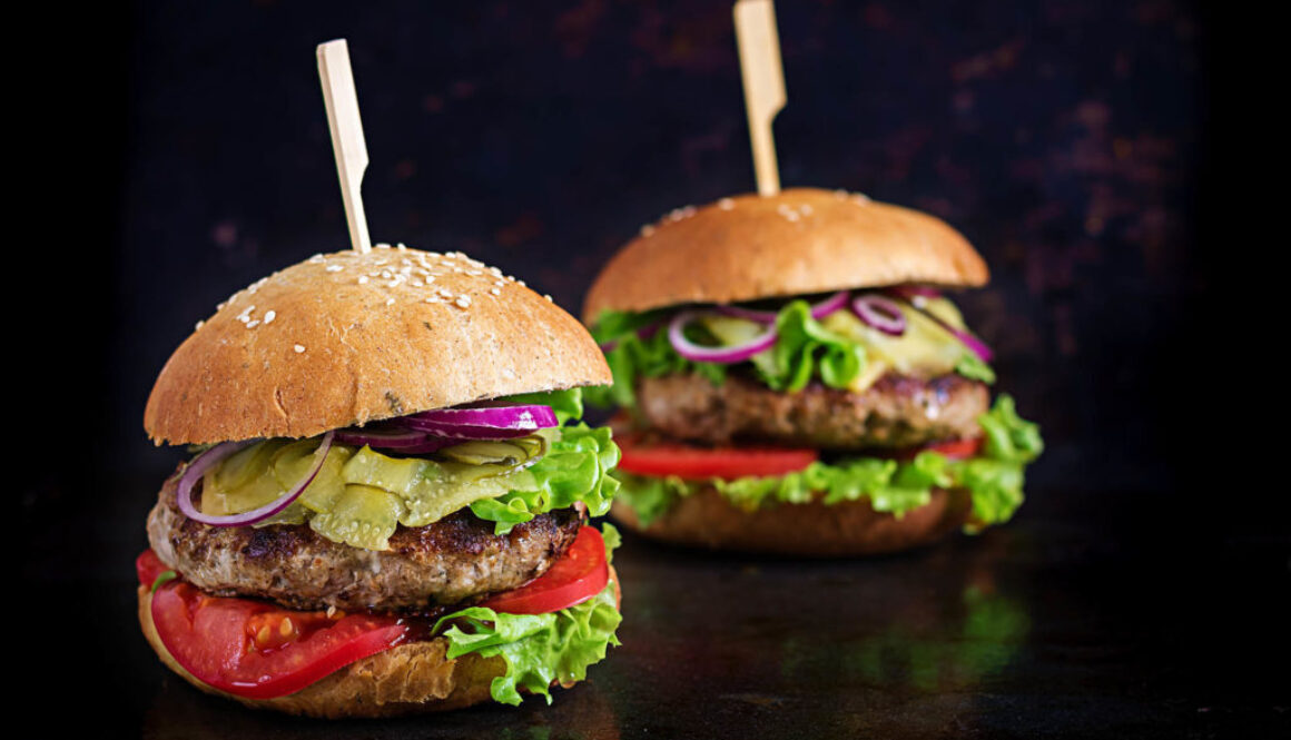 Big sandwich - hamburger burger with beef,  tomato, cheese and p